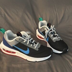 Nike Kids Black and Blue Air Cushion Sneakers